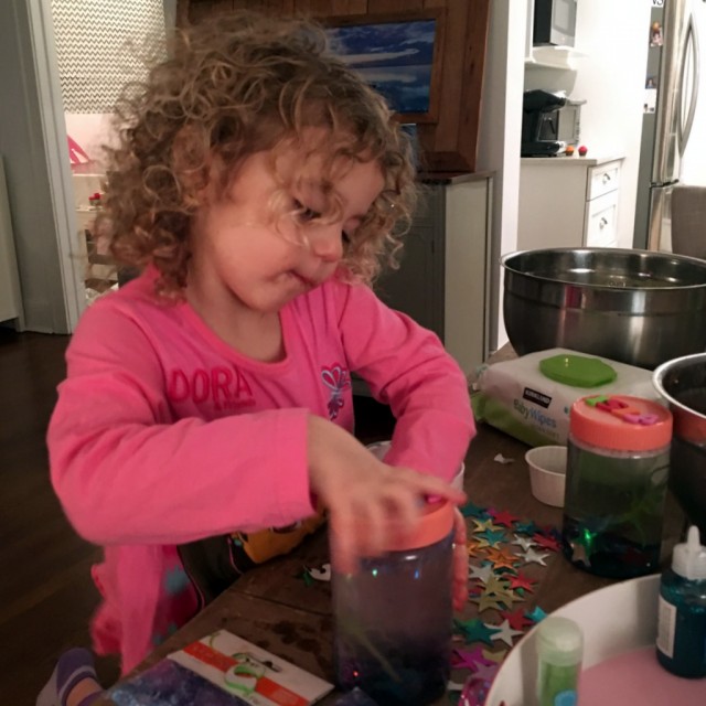 Making glitter jars at the Duffy's New Year's Eve PJ Party